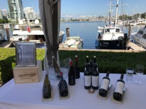 wine bottles on a table at dockside